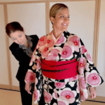 Travel Advisor Alexandra Vega trying a kimono while on a trip to Japan