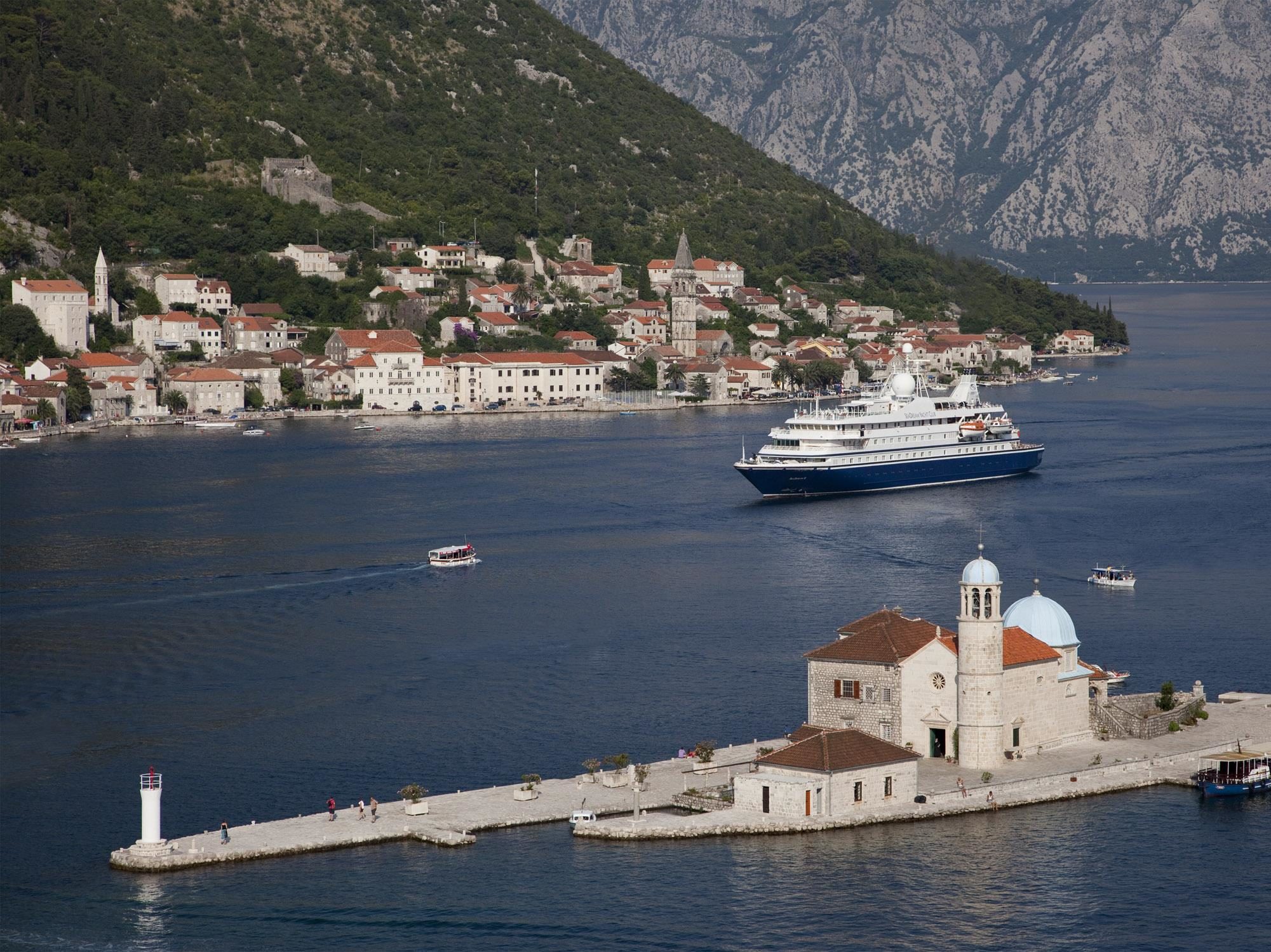Luxury yacht entering the harbor at Kotor, Croatia.